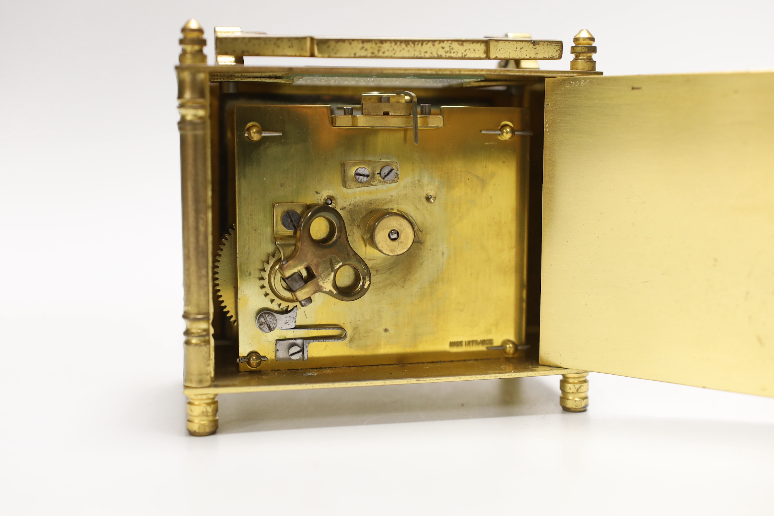 A small French brass carriage clock, 11cm, in leather case